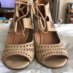 Restricted, Tan sandals